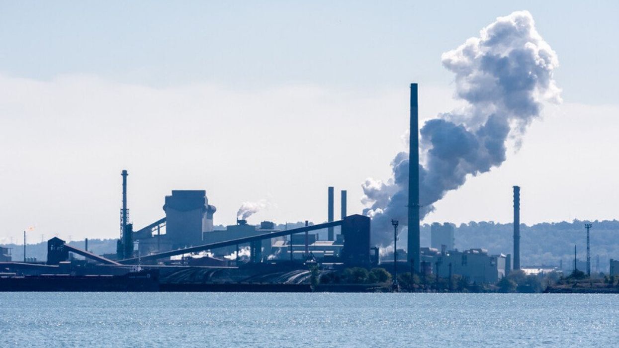 A large plume of steam coming from a steel plant in Hamilton, Ontario.