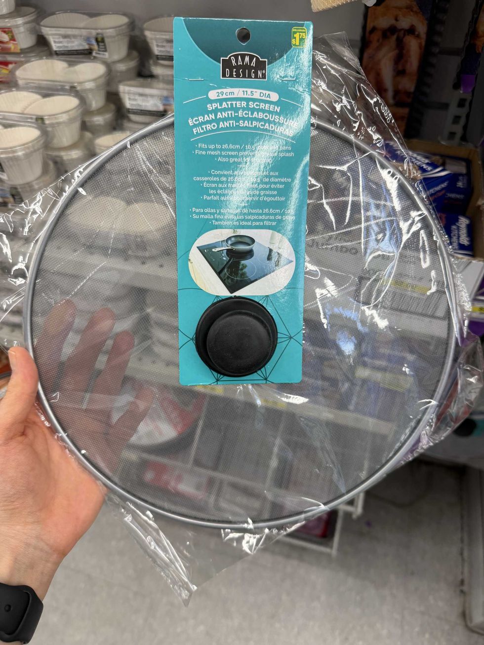A large splatter screen that looks like a pot lid.
