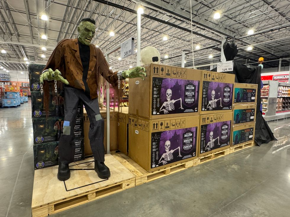 A life-sized mannequin of Frankenstein in Costco's Halloween section.