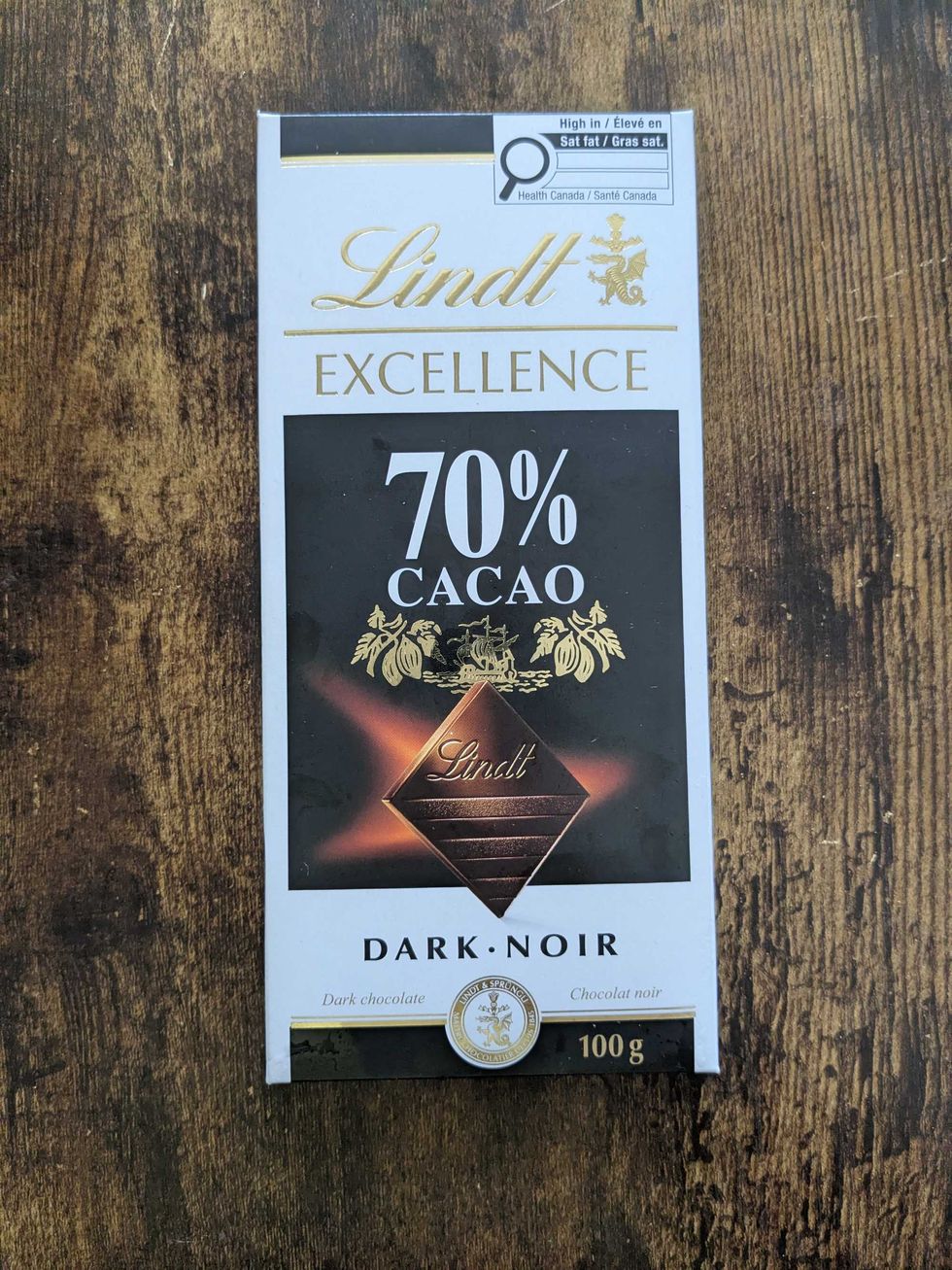 A Lindt dark chocolate bar on a counter