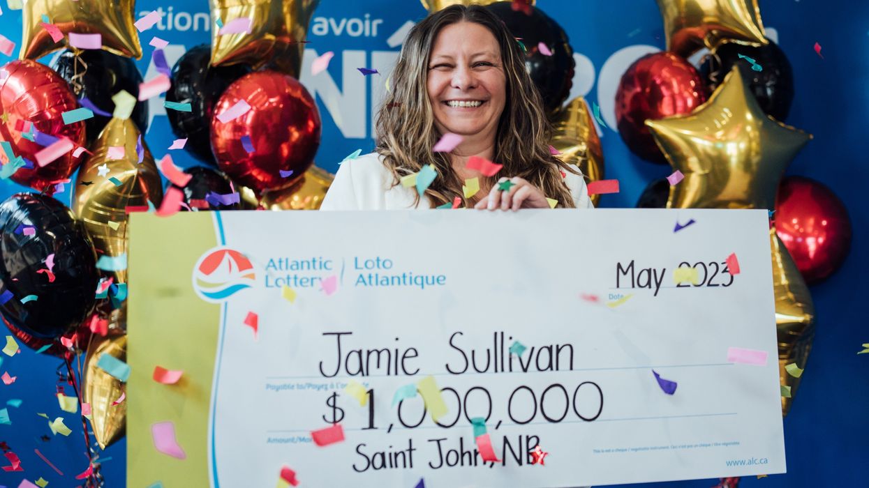 A lotto winner in New Brunswick with a $1 million cheque.
