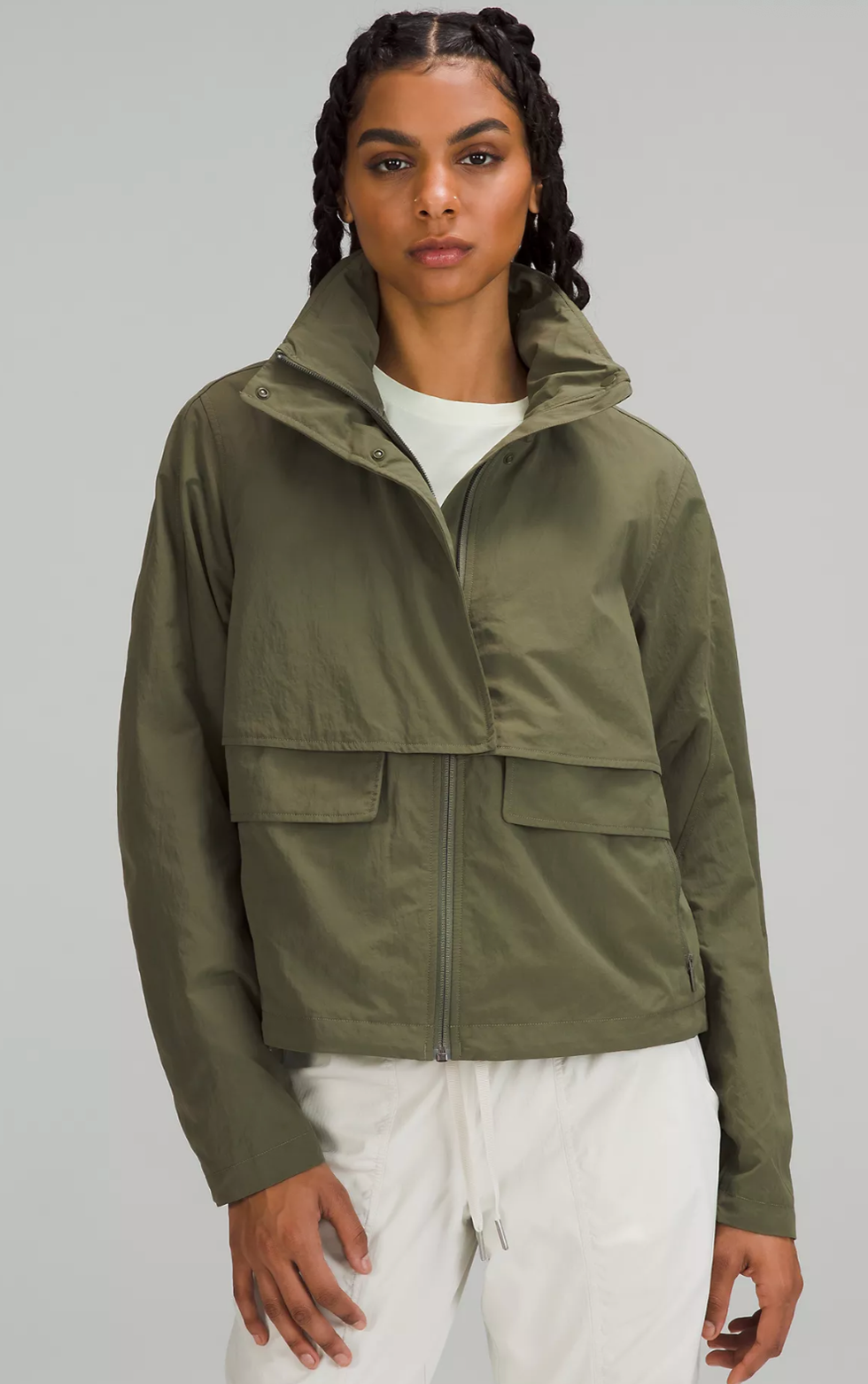A Lululemon model wearing the Always Effortless Jacket in Medium Olive.