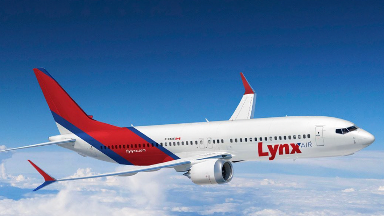 A Lynx Air plane in the sky.