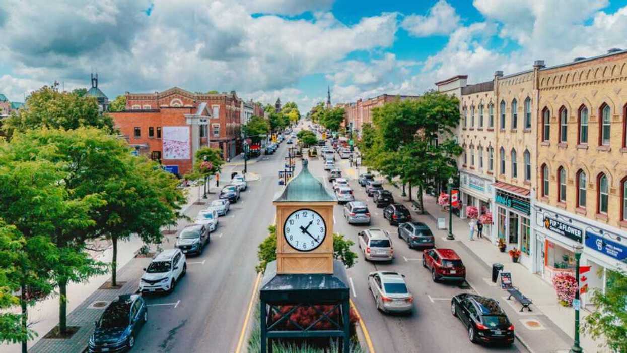 A main street with a clock tower.