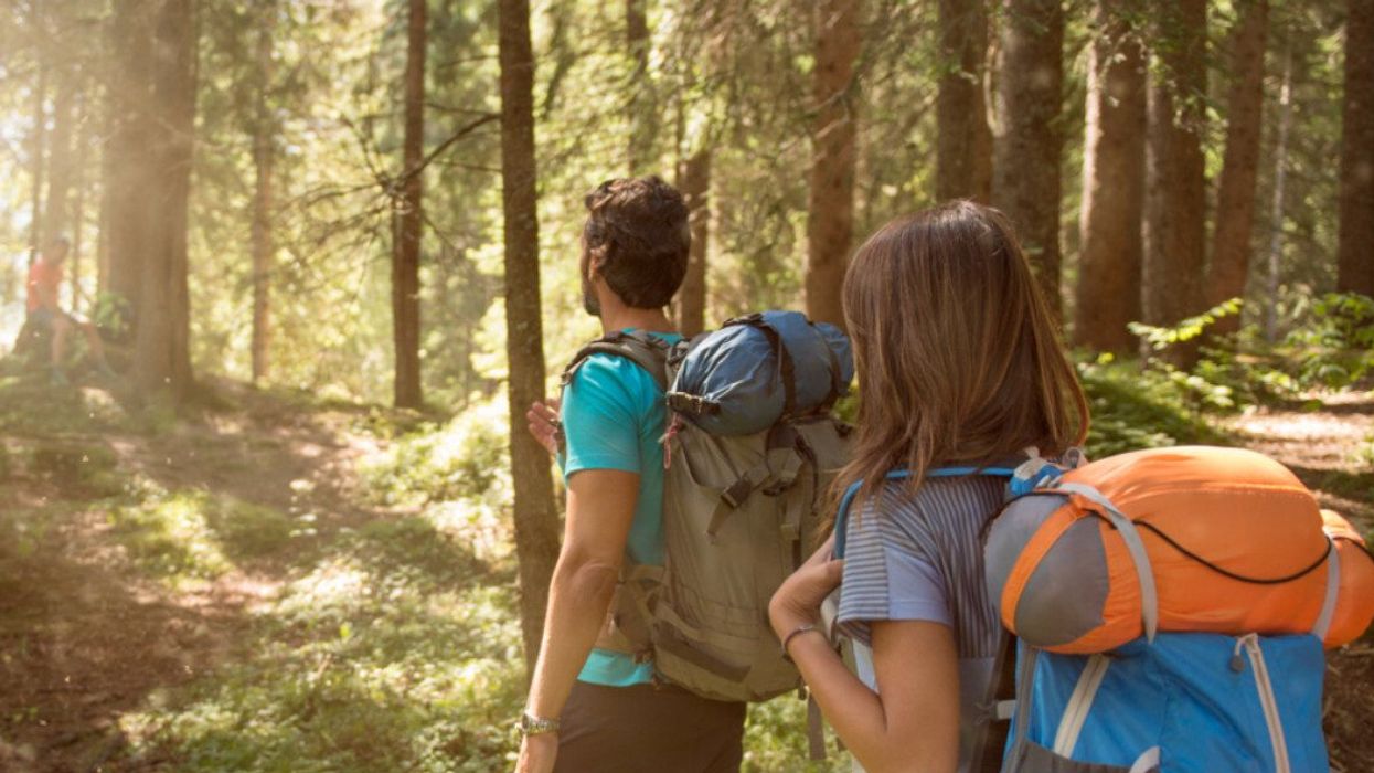 A man and woman hiking.