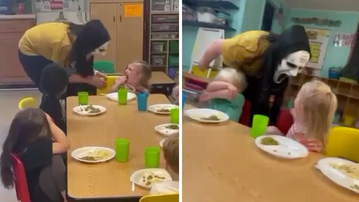 A masked person scaring children at a daycare.