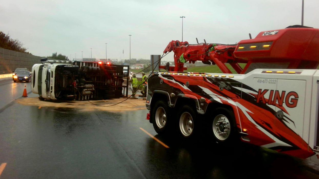 A Massive Meat Truck Rolled Over On Highway 401 This Morning & Blocked Traffic (PHOTOS)