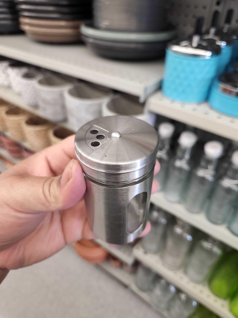 A metal spice container.