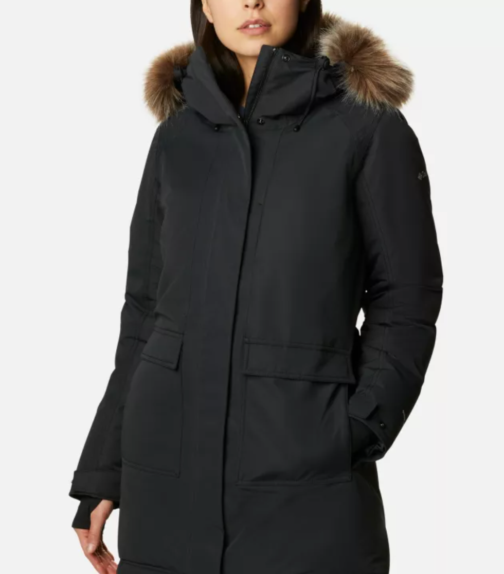 A model wearing a black winter jacket.