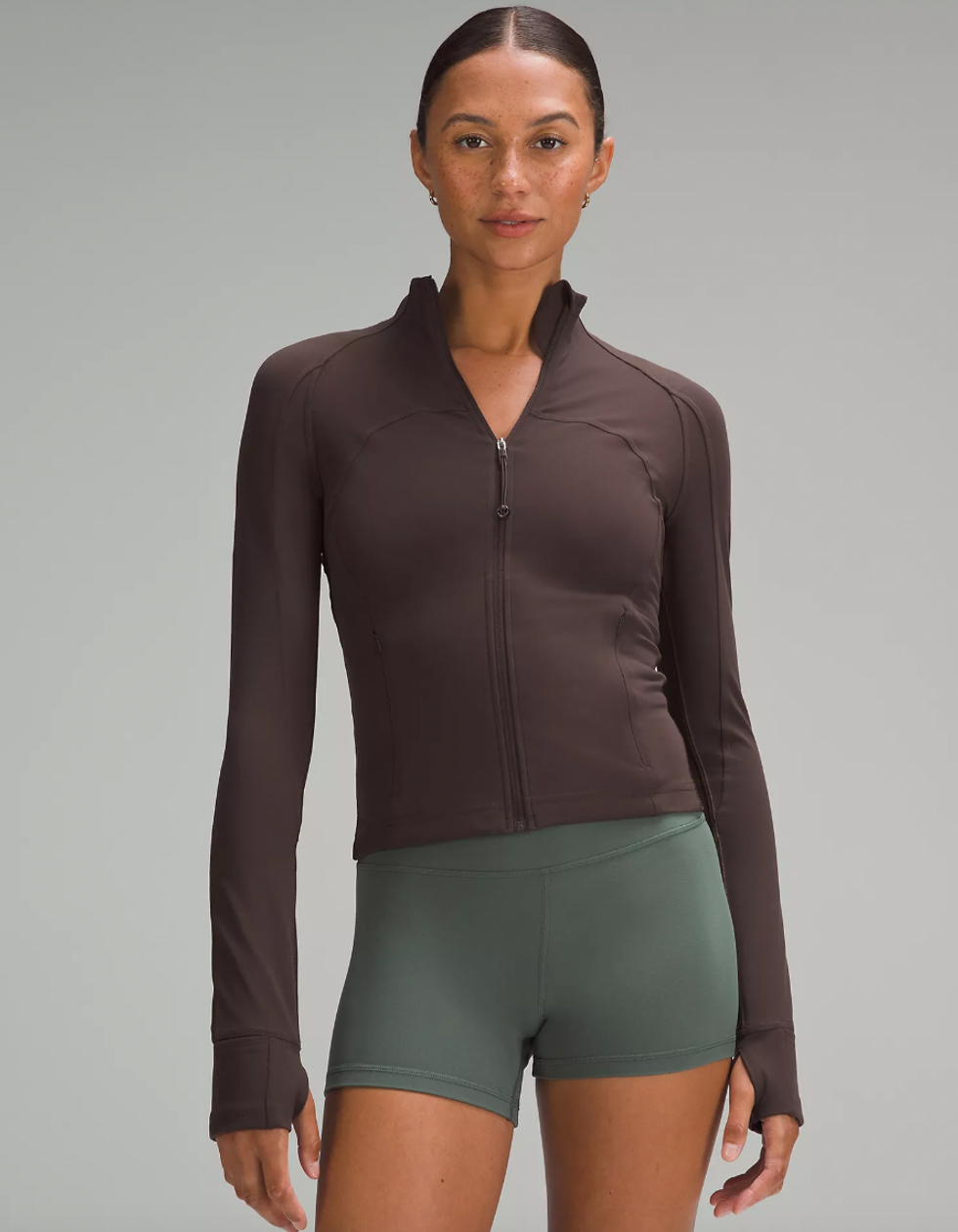 A model wearing Lululemon's Define Cropped Jacket Nulu.