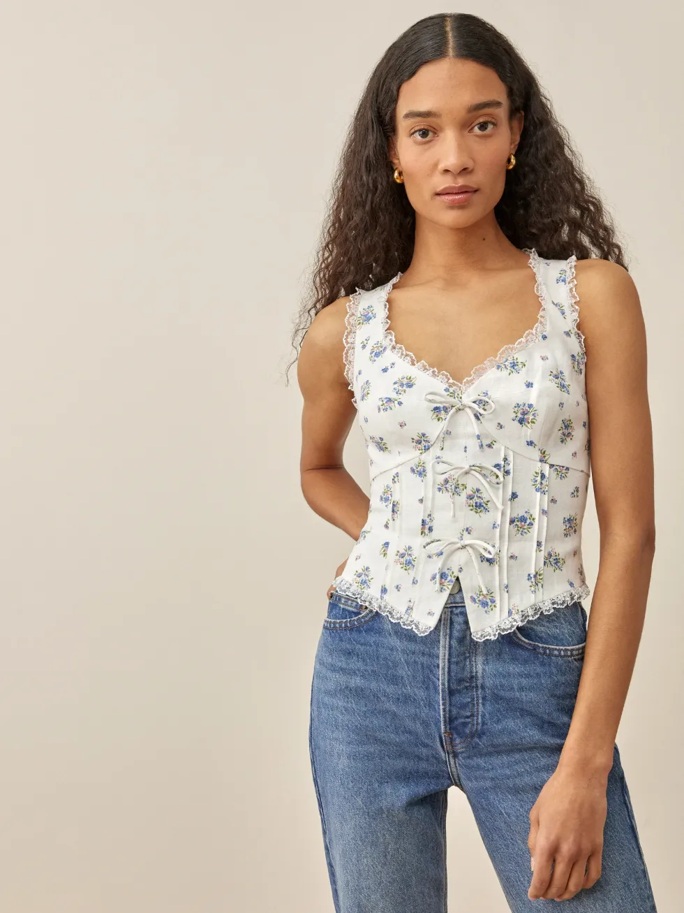 A model wearing the Brenda Linen Top.