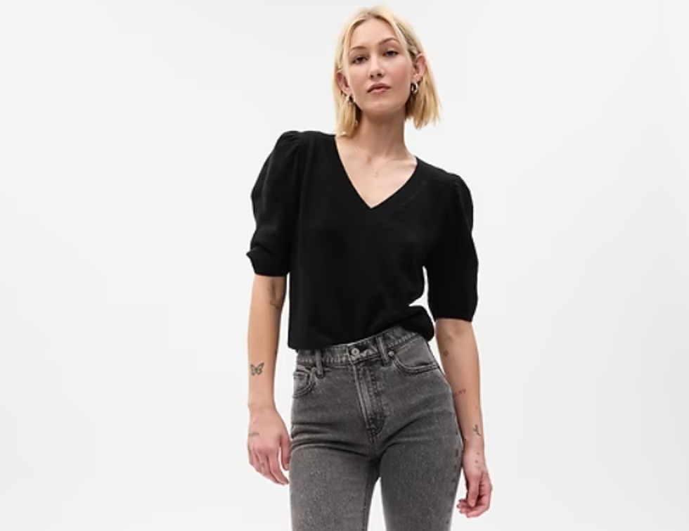 A model wearing the CashSoft Puff Sleeve Sweater from Gap.