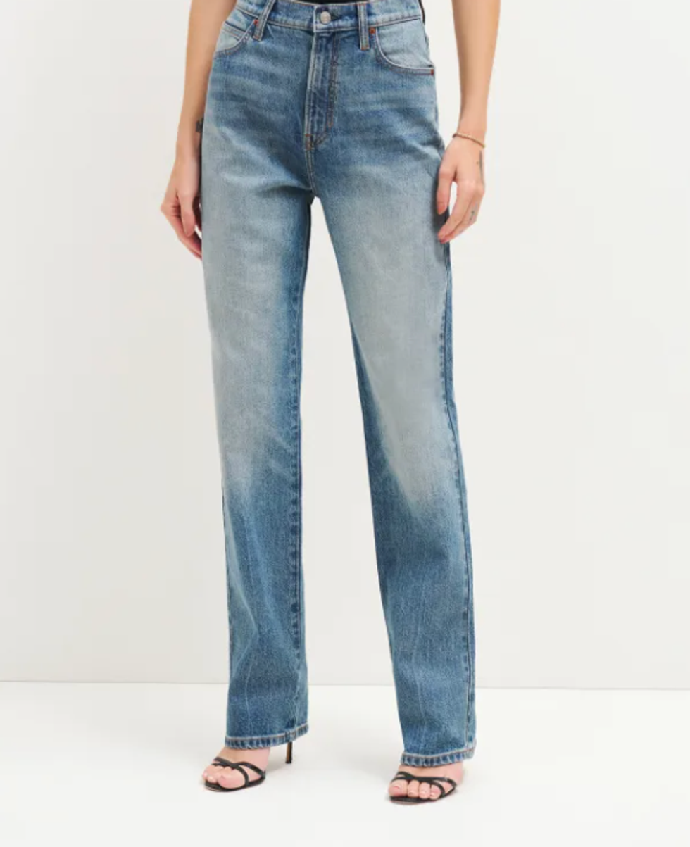 A model wearing the Elan Ultra High Rise Straight Leg Jeans.