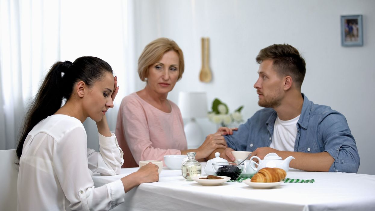 A mother-in-law, her son and his girlfriend.