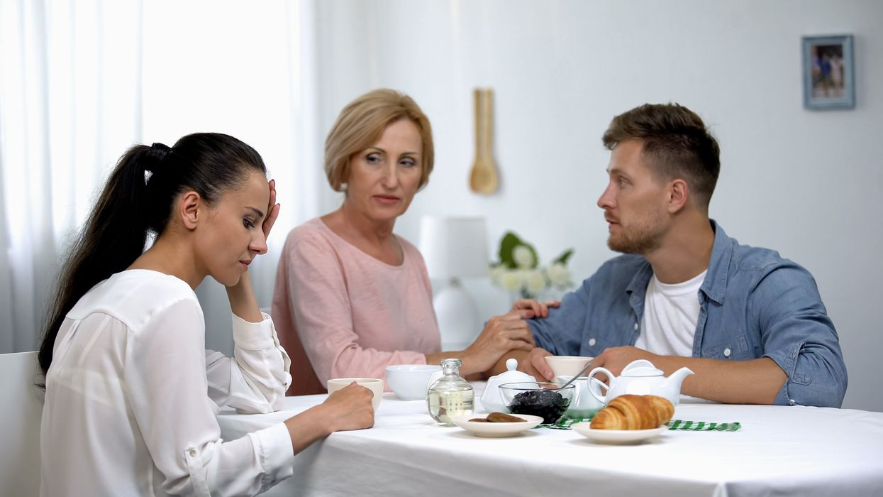 A mother-in-law, her son and his girlfriend.