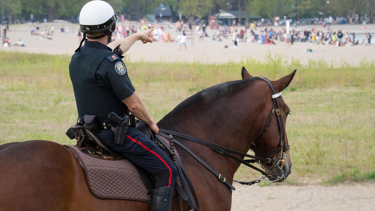 A mounted Toronto police officer at Woodbine Beach.
