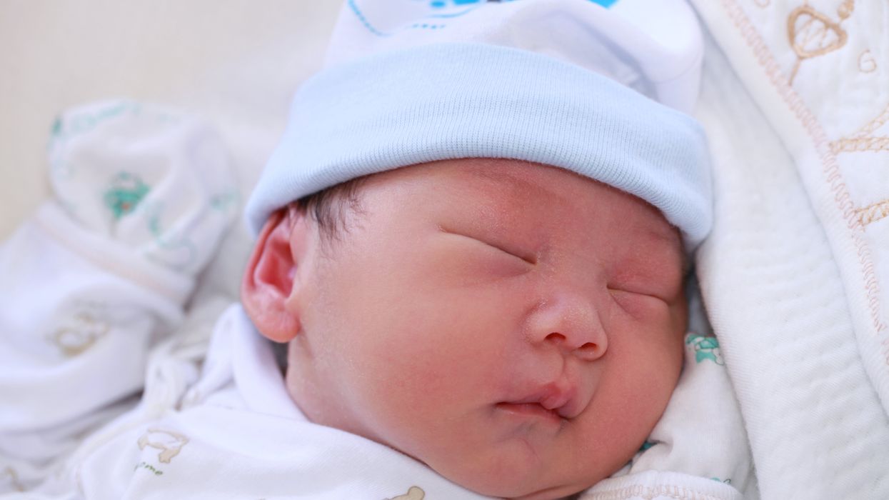 A newborn baby boy.