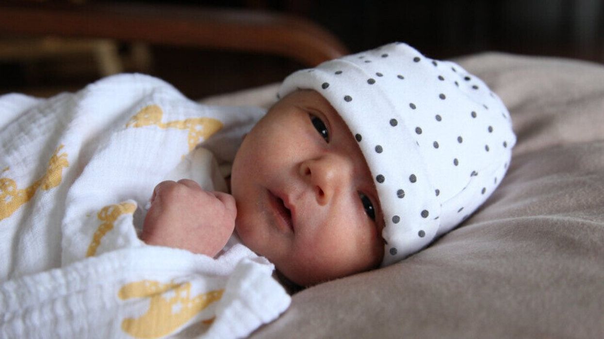 A newborn baby.