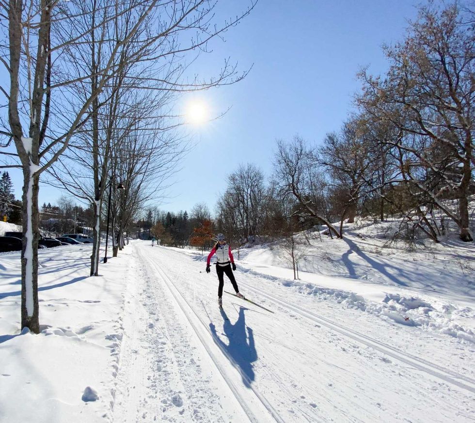 A nordic skier on Quebec's P'tit Train du Nord.