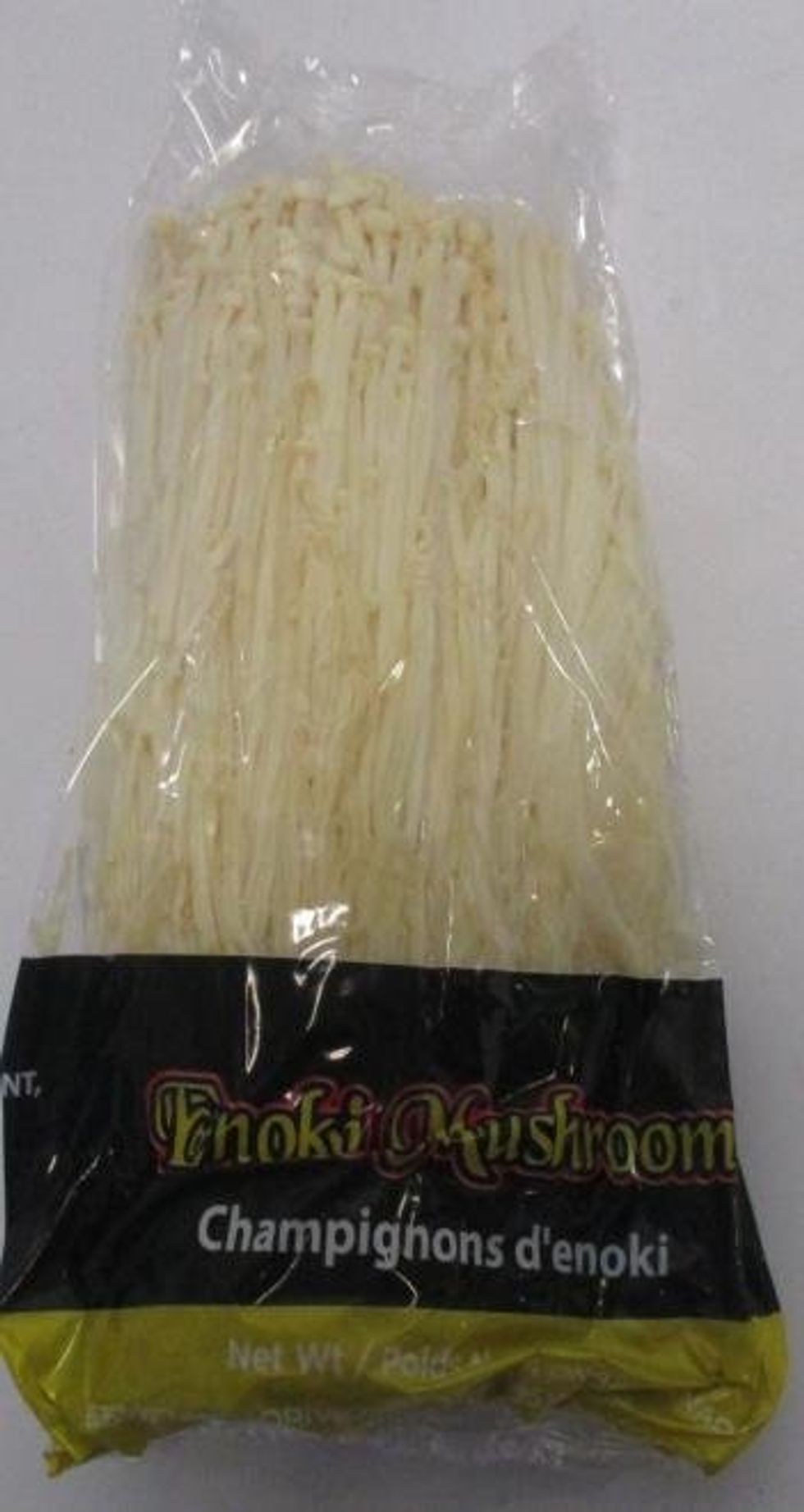 A package of enoki mushrooms.