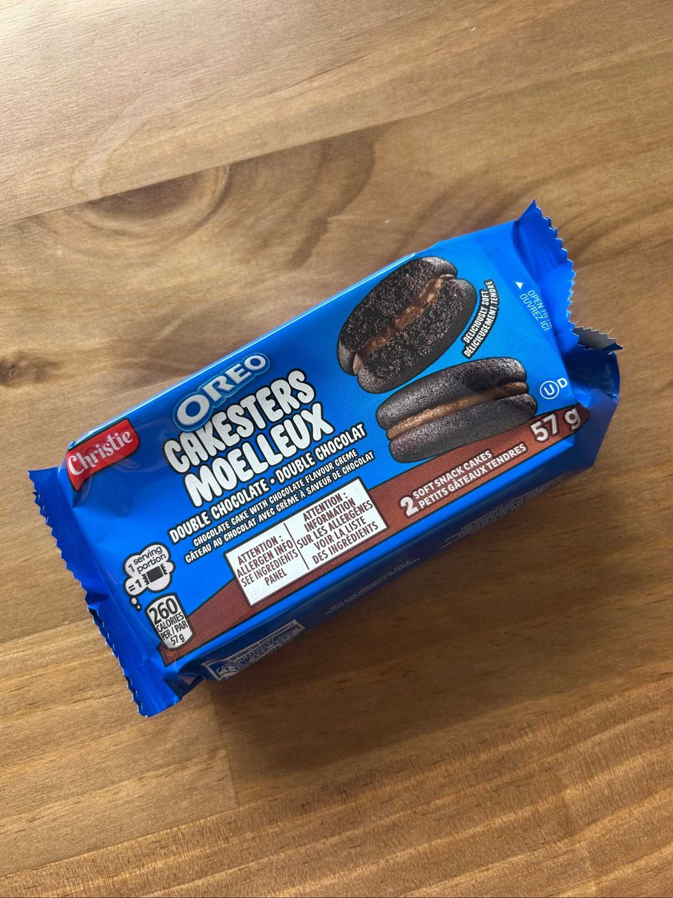 A packet of Oreo Cakesters on a wooden table.