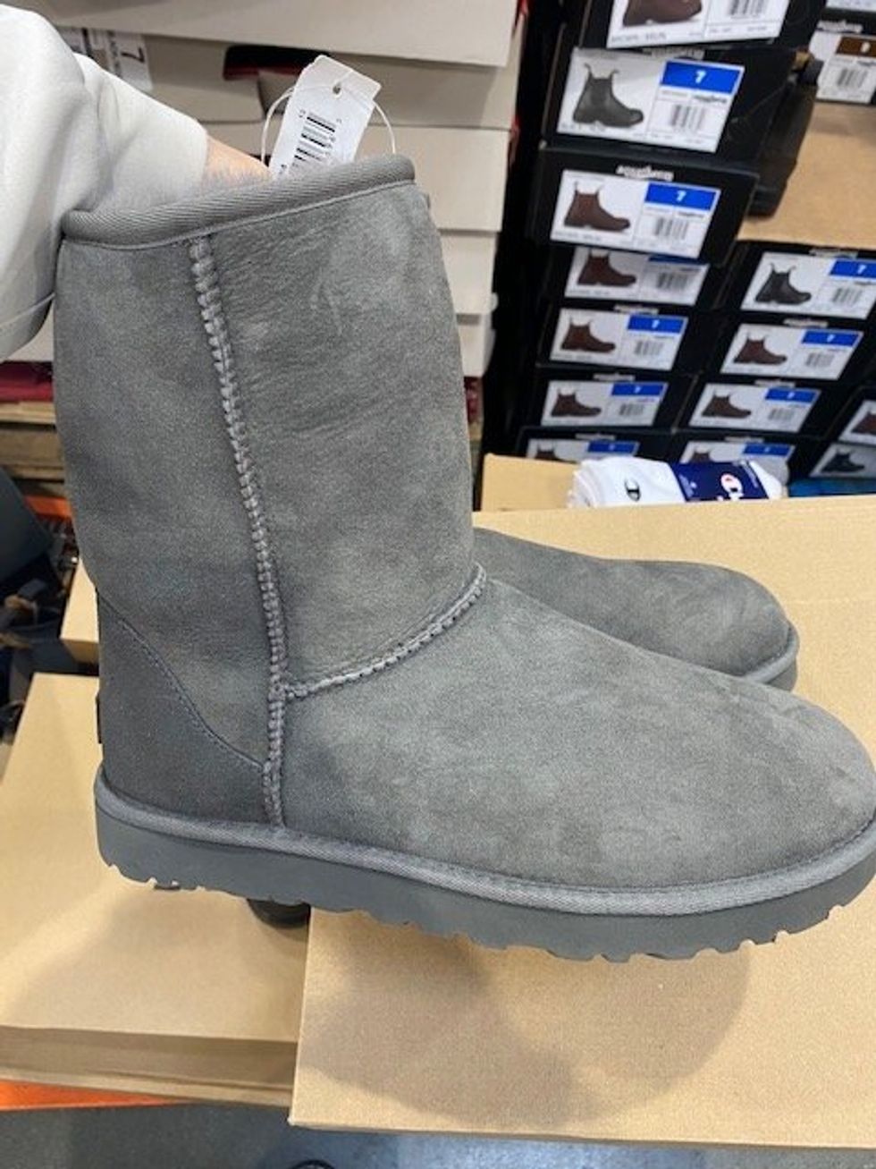 A pair of grey Uggs on display at Costco.