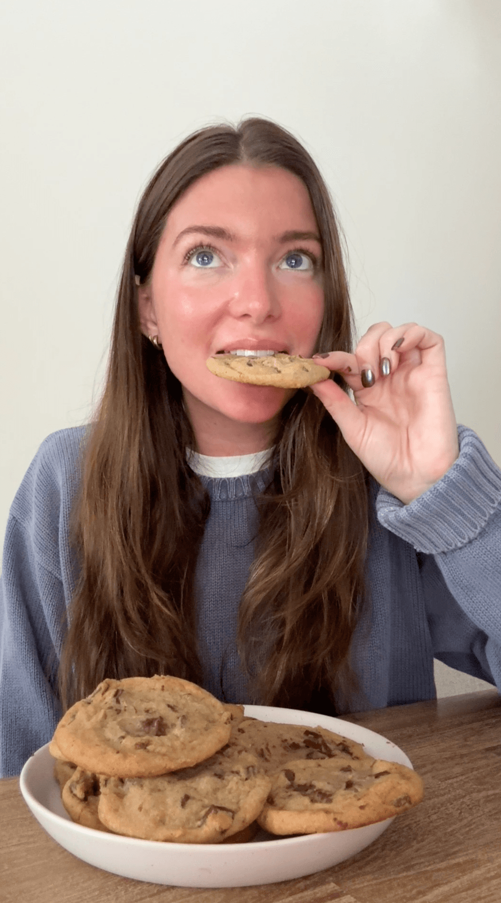 A person eating cookies.