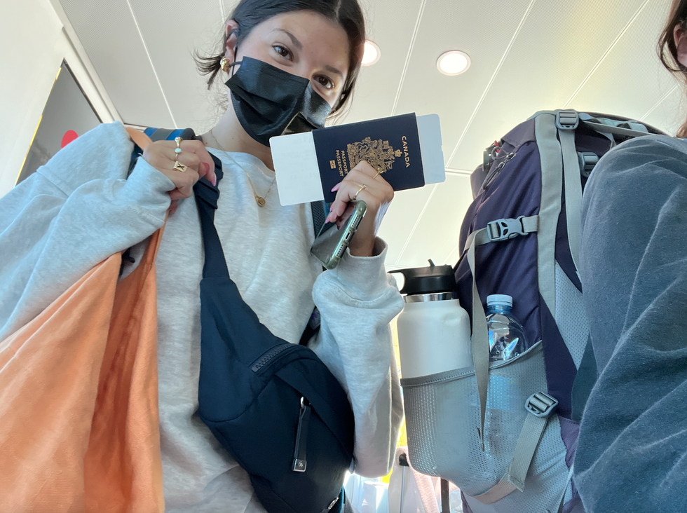 A person holding a passport.