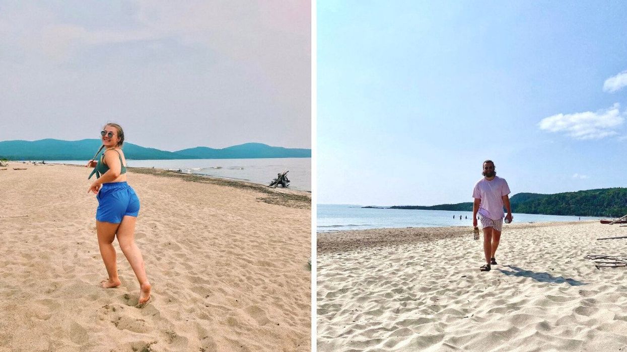 A person on a sandy beach.