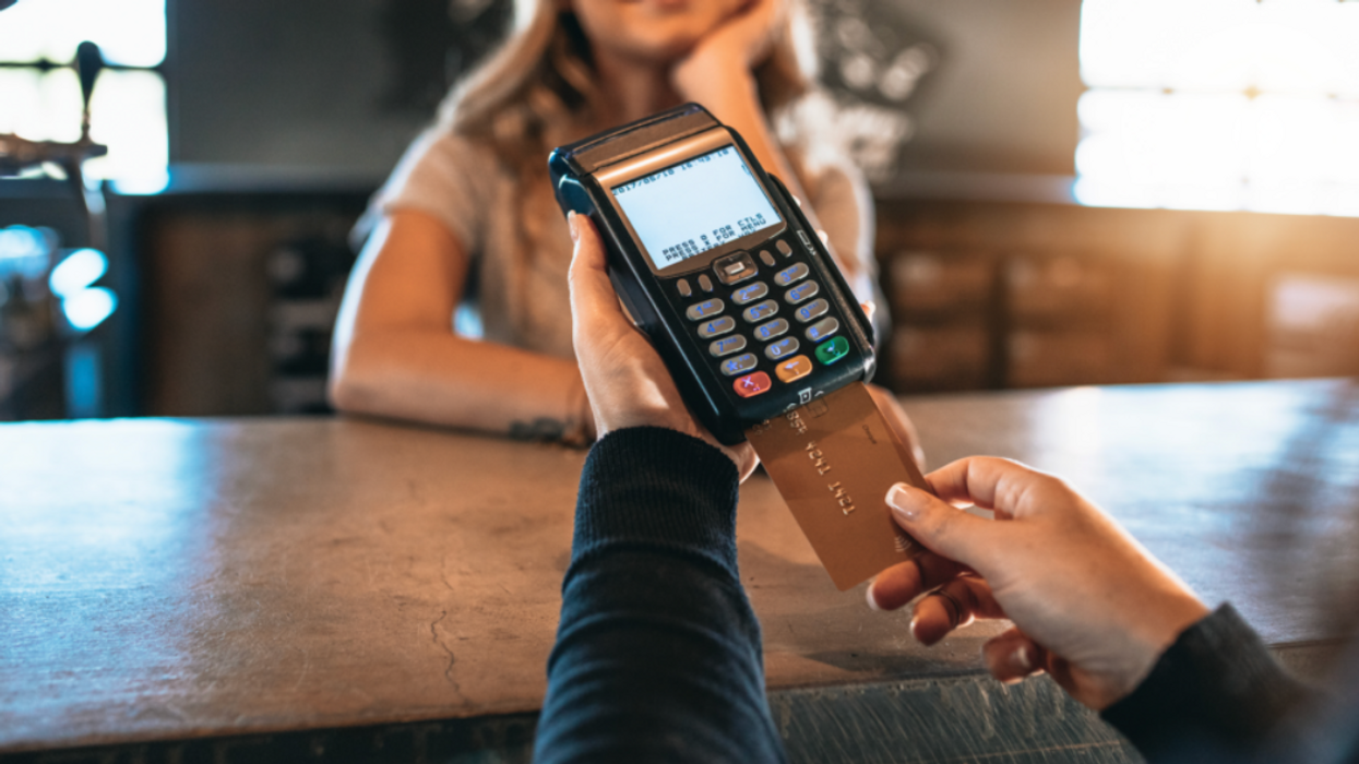 A person paying the bill.