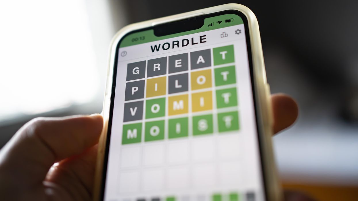 A person playing Wordle.
