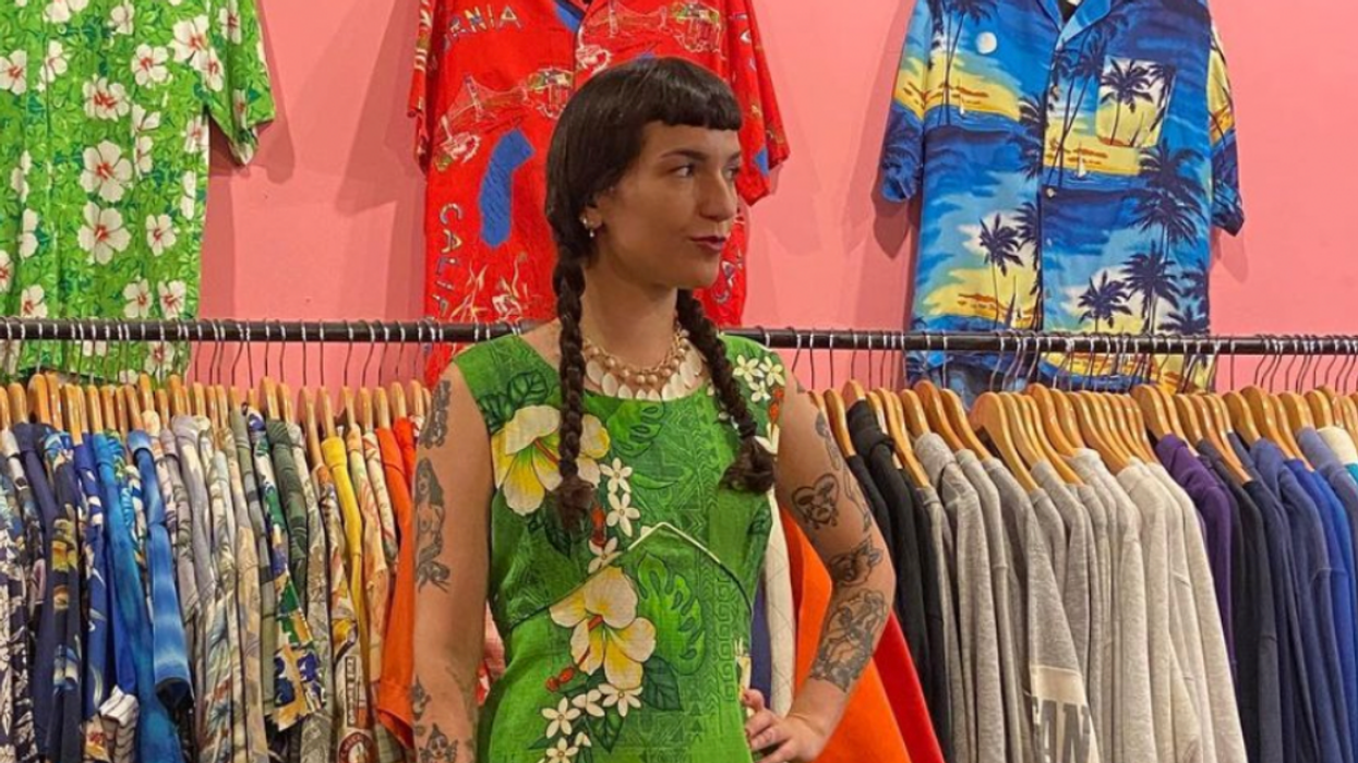 A person posing in Mama Love You Vintage.