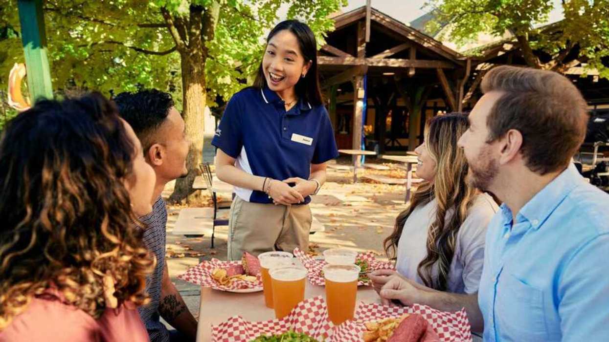 A person serving food.