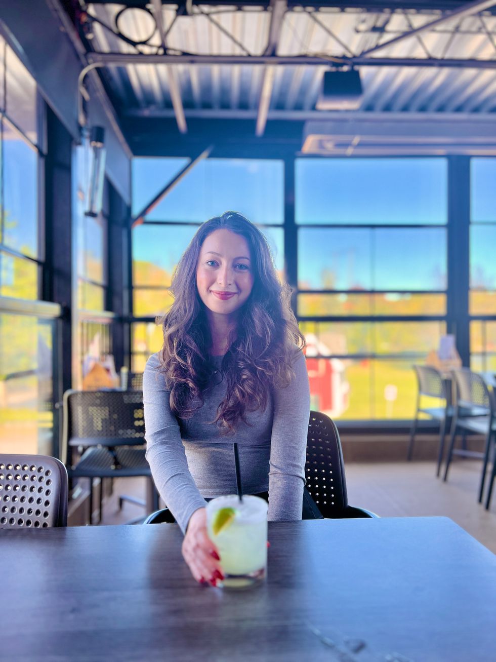A person sitting at a restaurant.