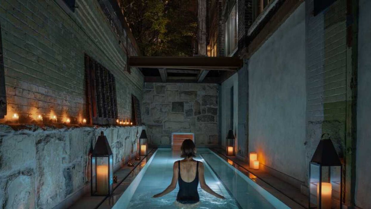 A person standing in a spa.