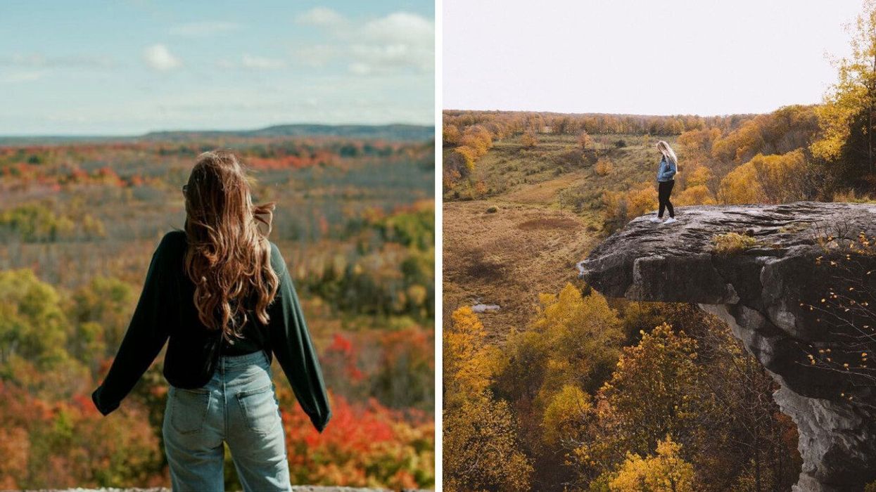 A person standing on the edge of a cliff.