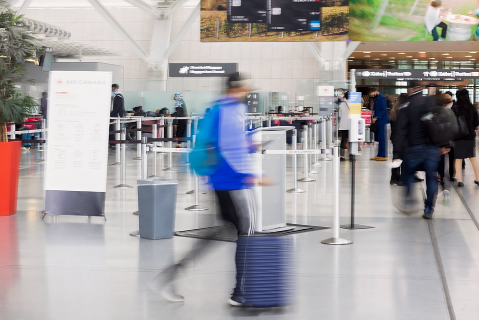 A person walks through Toronto Pearson Airport.