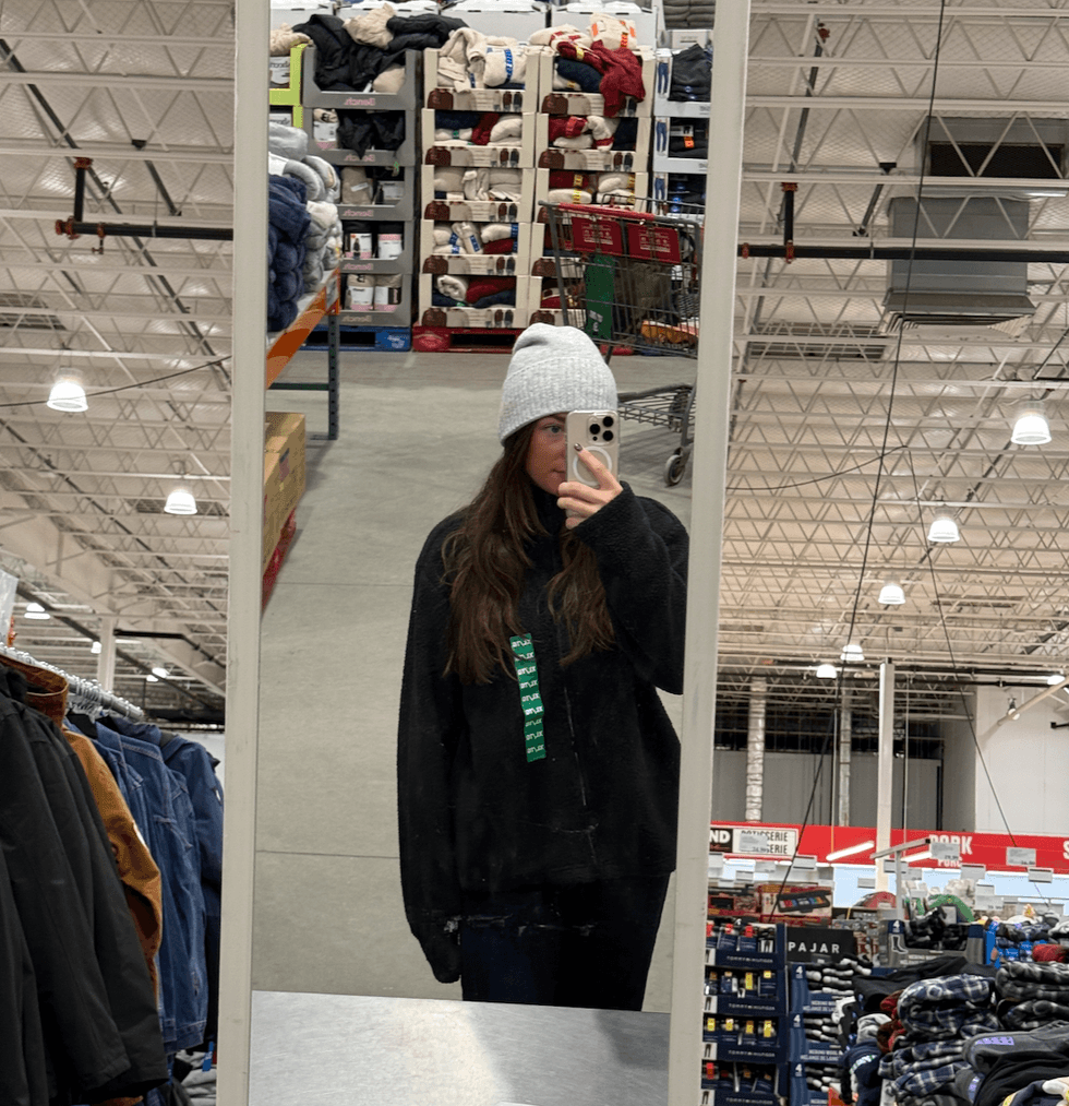 A person wearing a sweater.