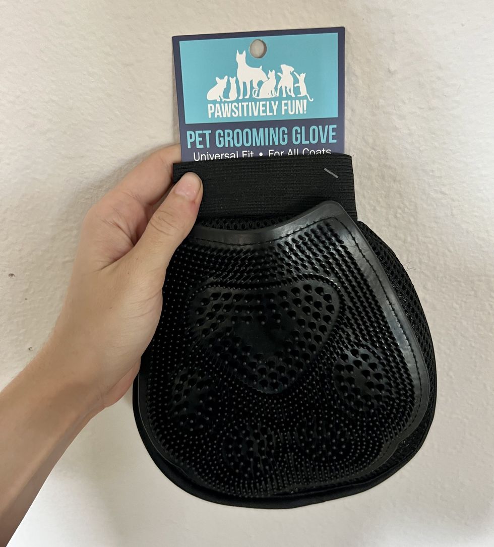 A pet grooming glove from Five Below.