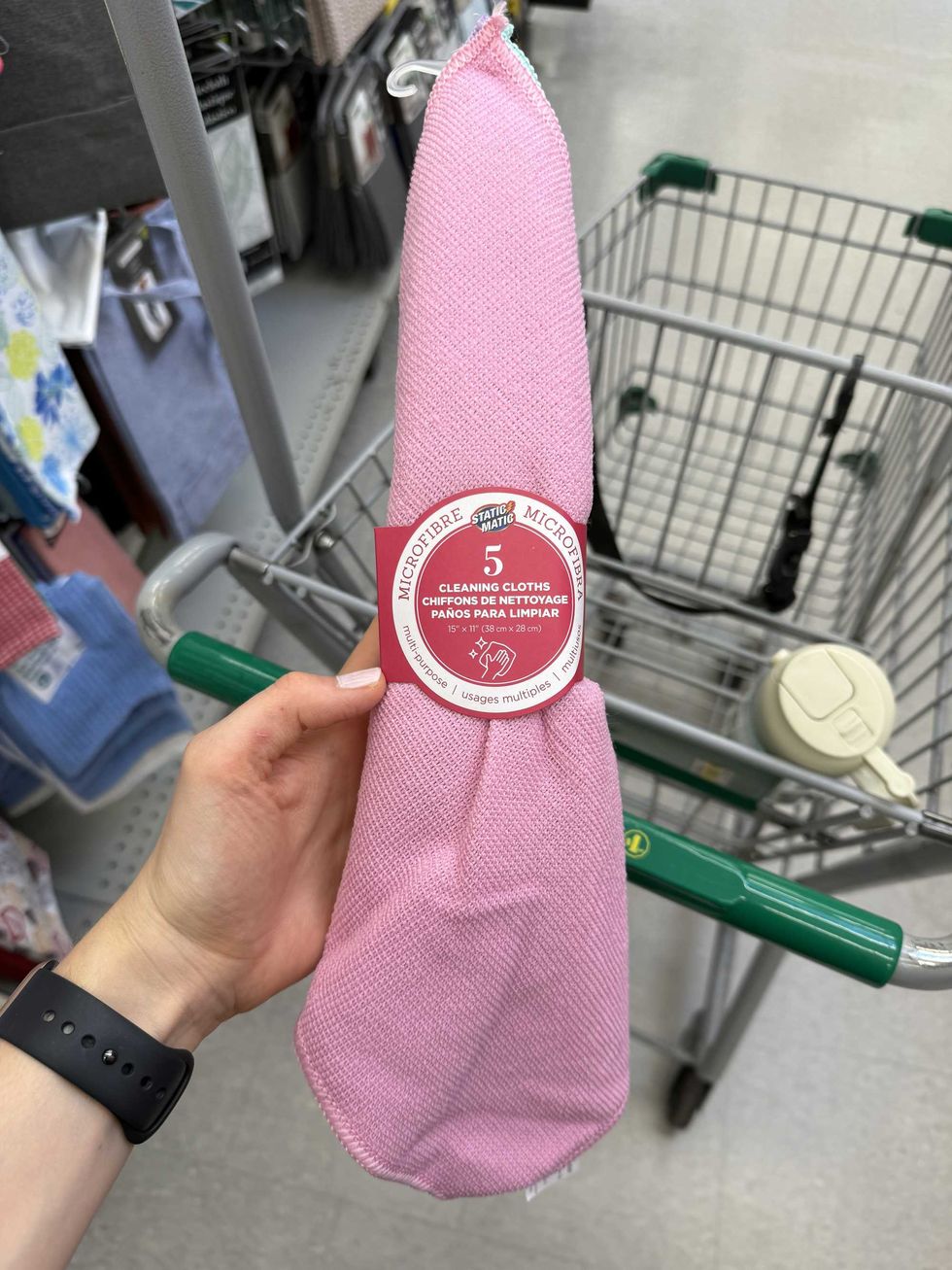 A pink cloth with a label that says microfibre cleaning cloths.