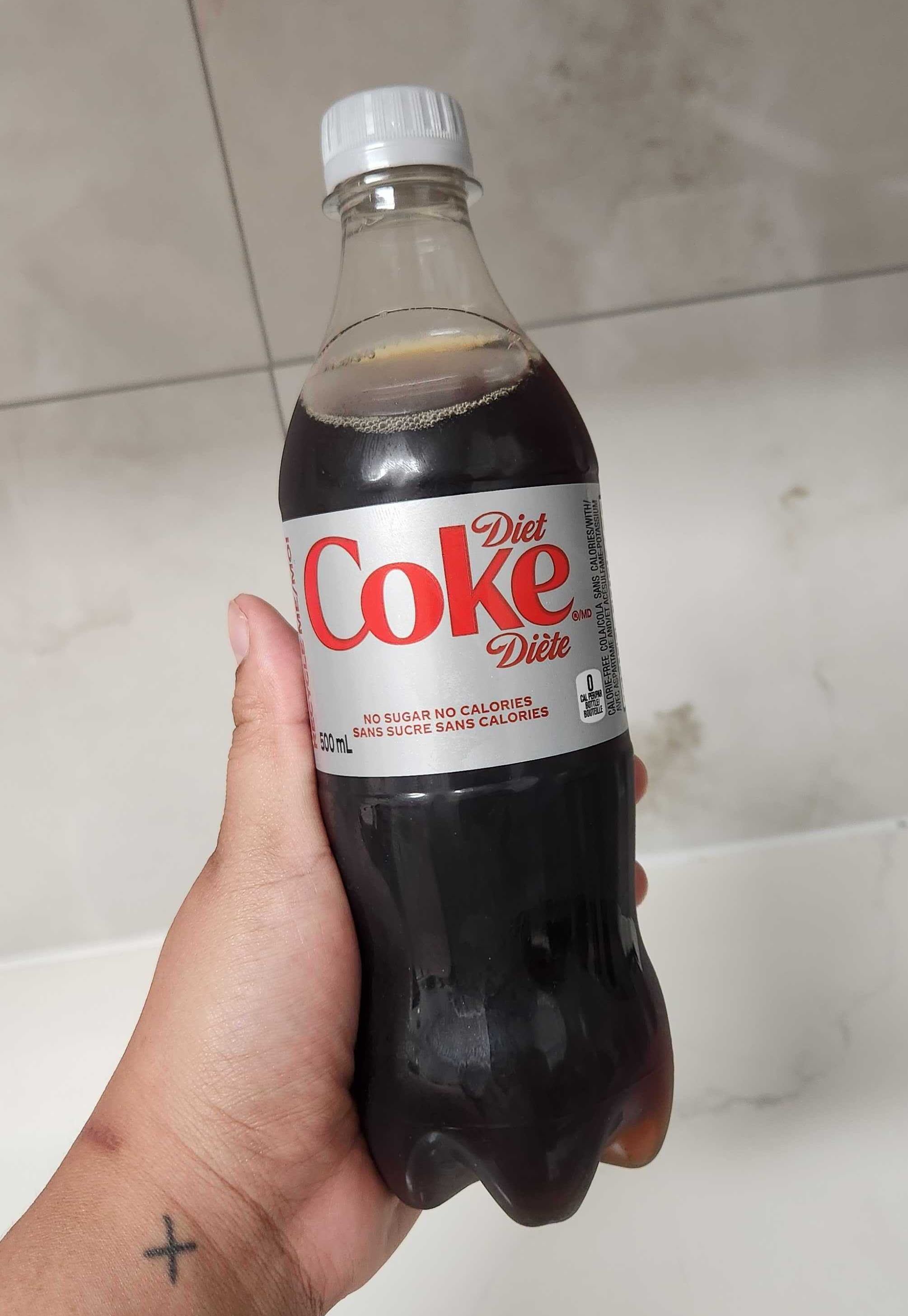 A plastic bottle of Diet Coke.