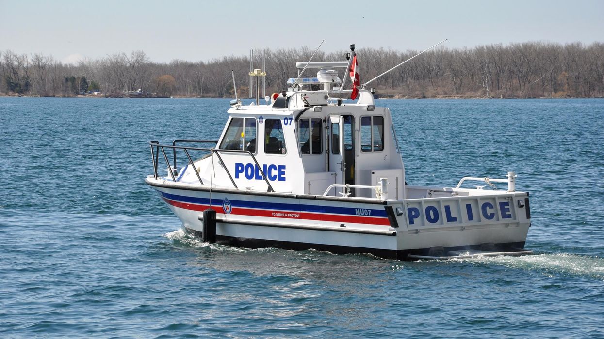 A police boat cruising an Ontario lake.