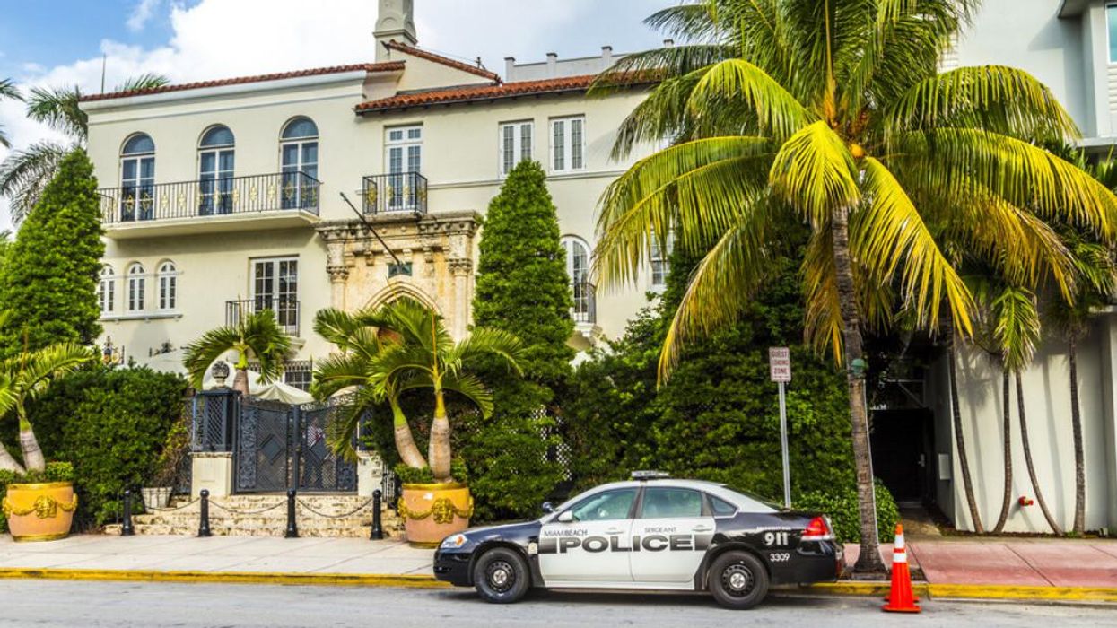 A police car in front of the Versace Mansion in Miami, Florida.