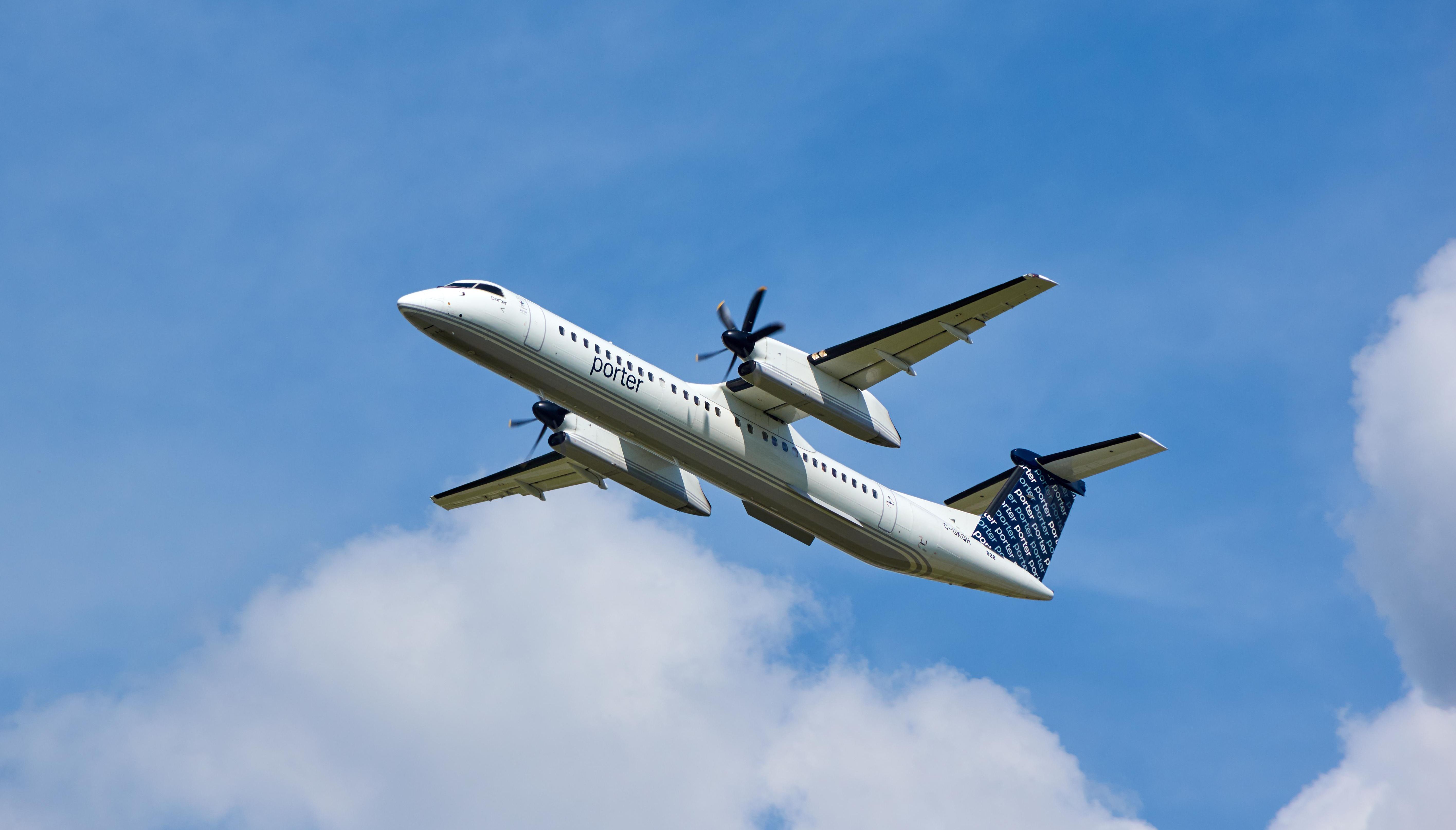 A Porter Airlines plane in the sky.