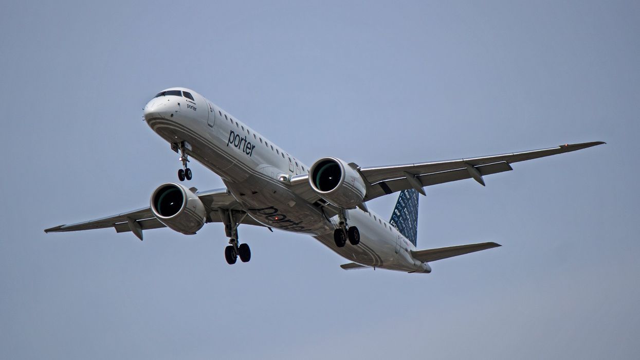 A Porter Embraer E195-E2 plane in flight.