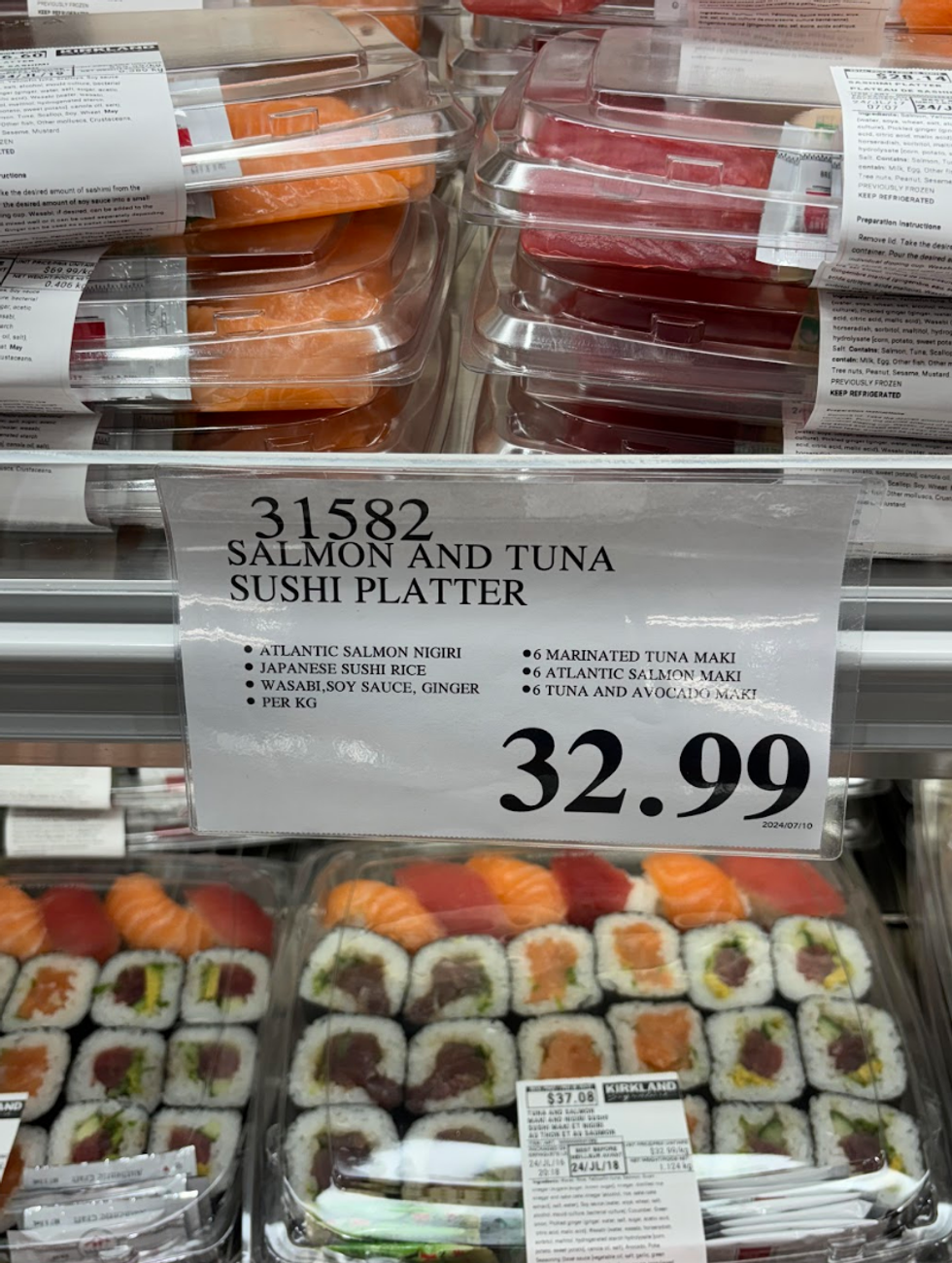 A price sign for sushi. 