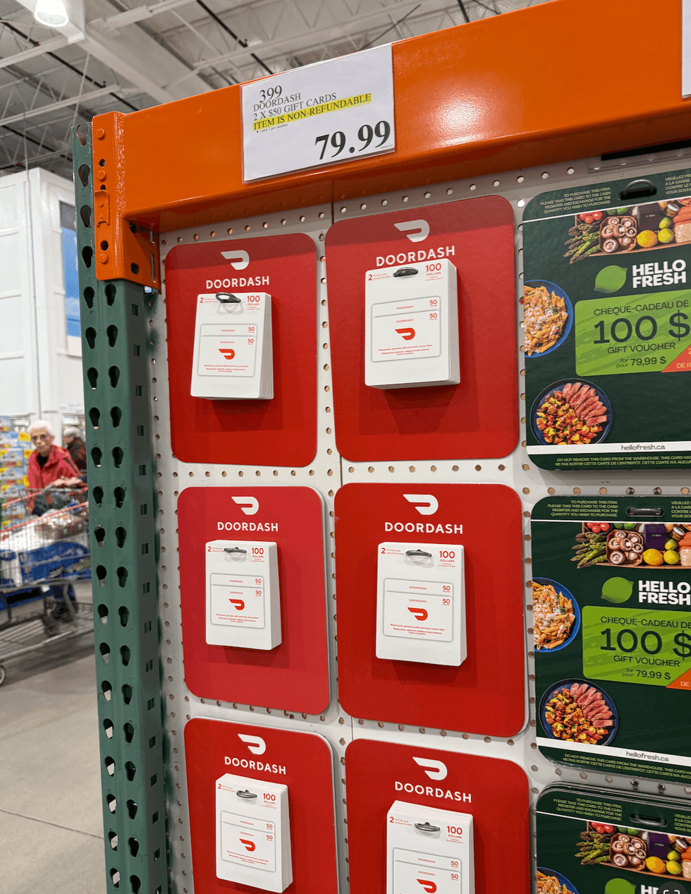A rack of DoorDash gift cards at Costco.