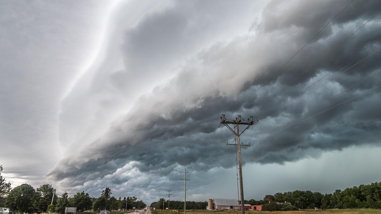 A raincloud hanging over an Ontario highway.