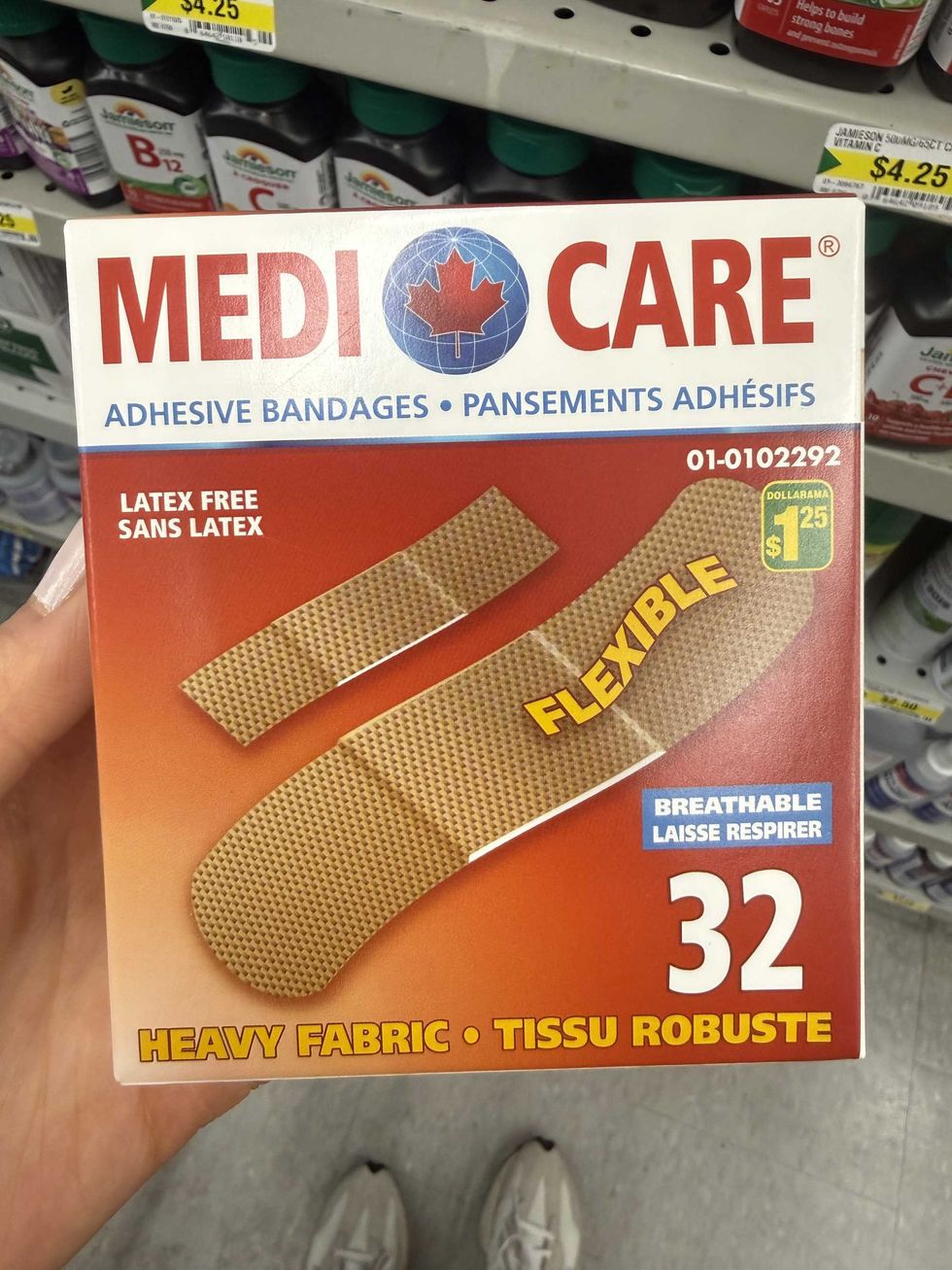 A red and white box with brown bandages on the front.