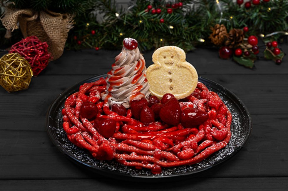 A red-coloured funnel cake with an ice cream swirl and sugar cookie from Canada's Wonderland.